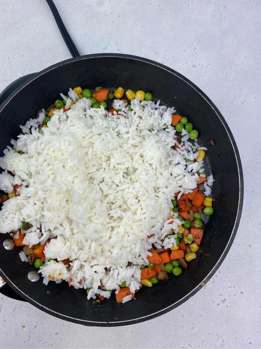 add rice to make shrimp fried rice