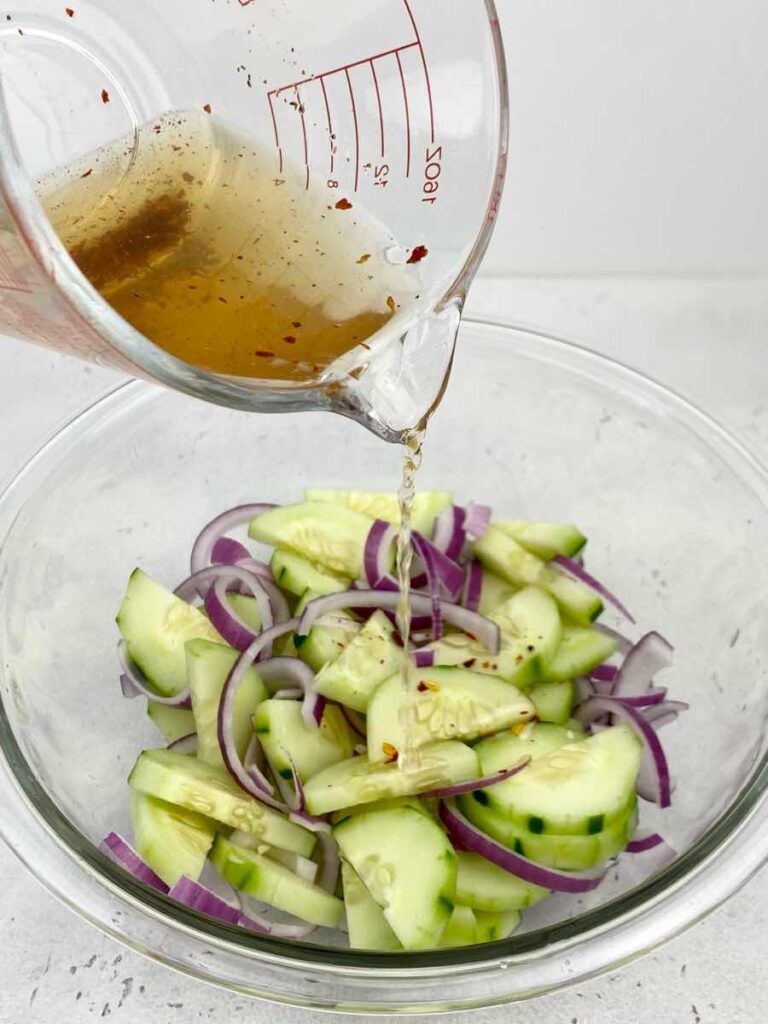 toss vinegar mixture over filipino cucumber salad