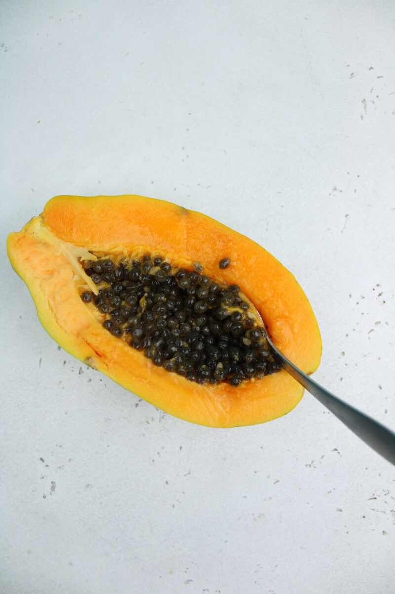 first step of papaya muffins it to remove seeds