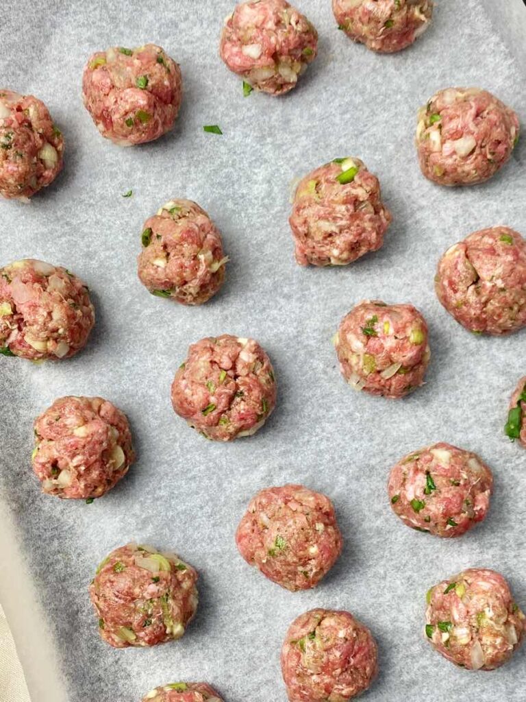 roll meatballs to form a ball shaped Asian Meatballs recipe