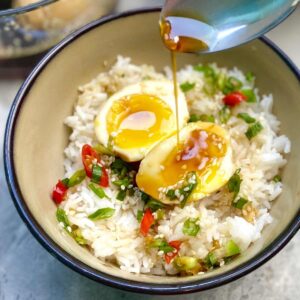 Mayak eggs served with rice in a bowl