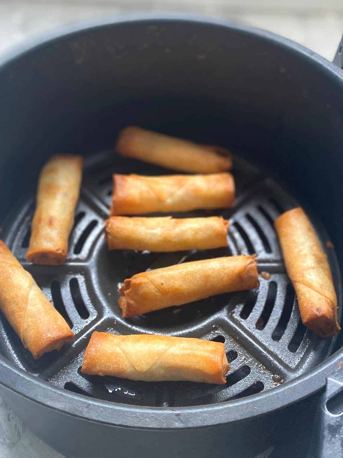 air fry frozen spring rolls In 390 F for 8 minutes until golden browned