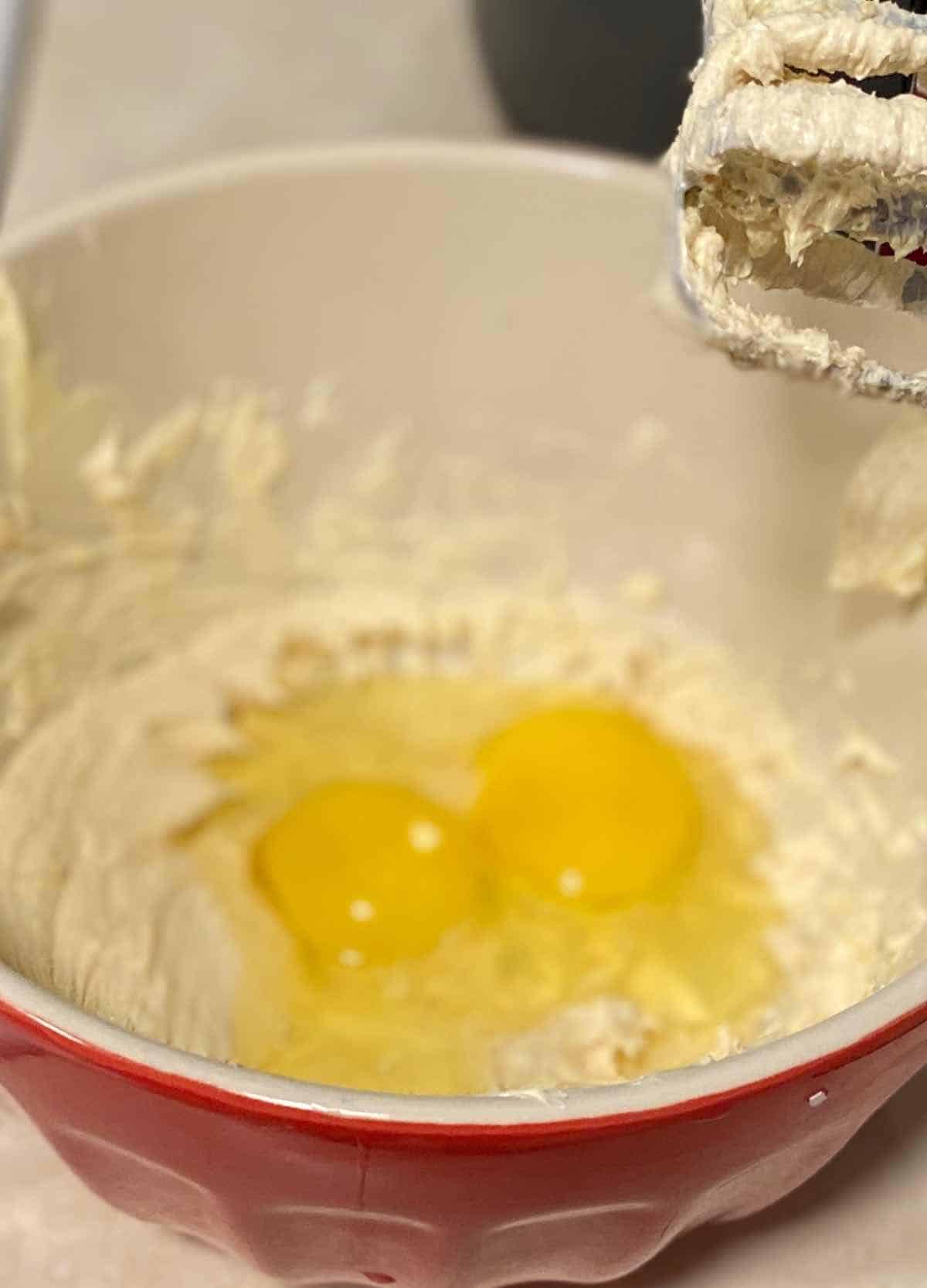 add eggs and vanilla extract in a bowl