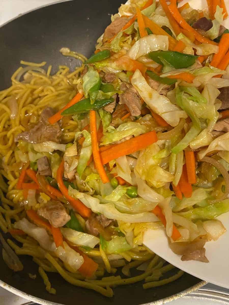 stir in veggies over pancit canton noodles
