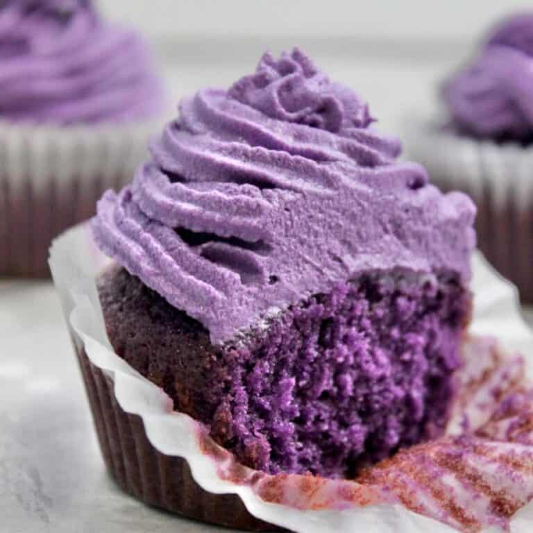 ube cupcakes with two in the background