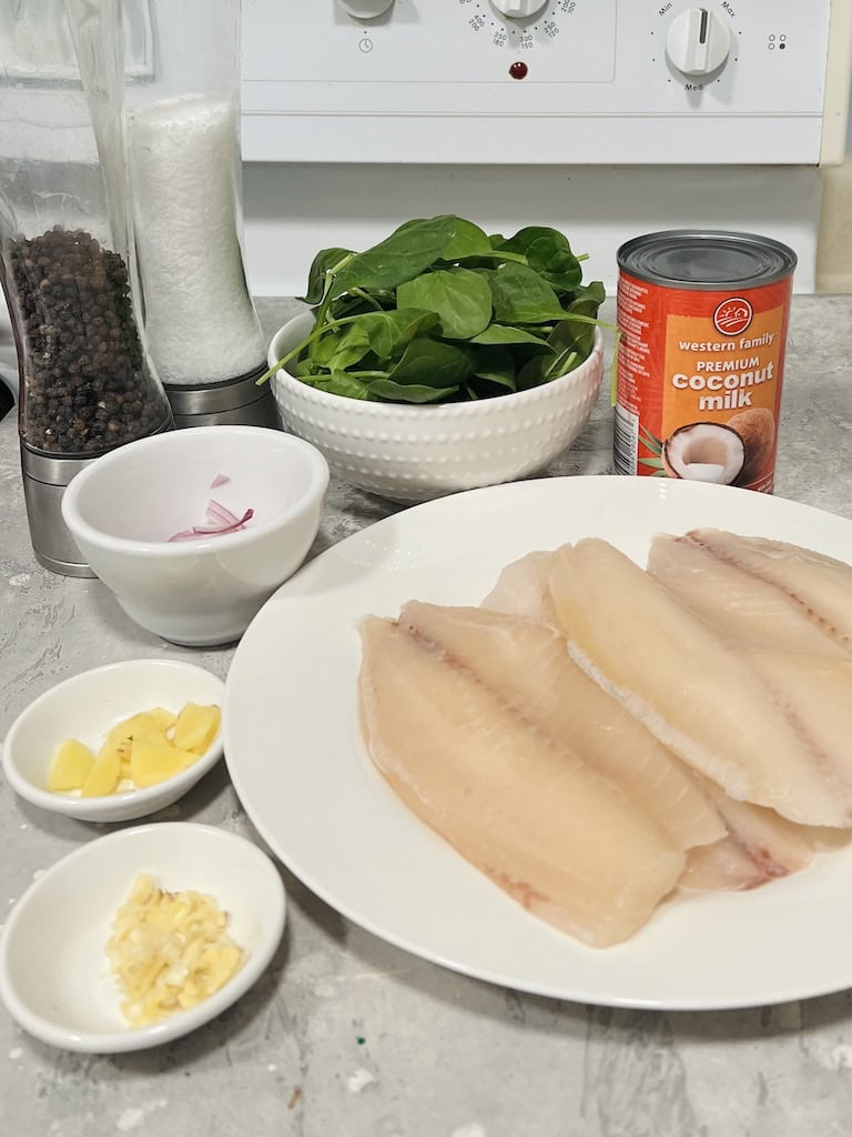 ingredients needed for Ginataang Tilapia, spinach, onion, garlic, ginger