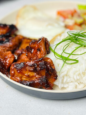 Chicken Tocino with rice and eggs on the plate