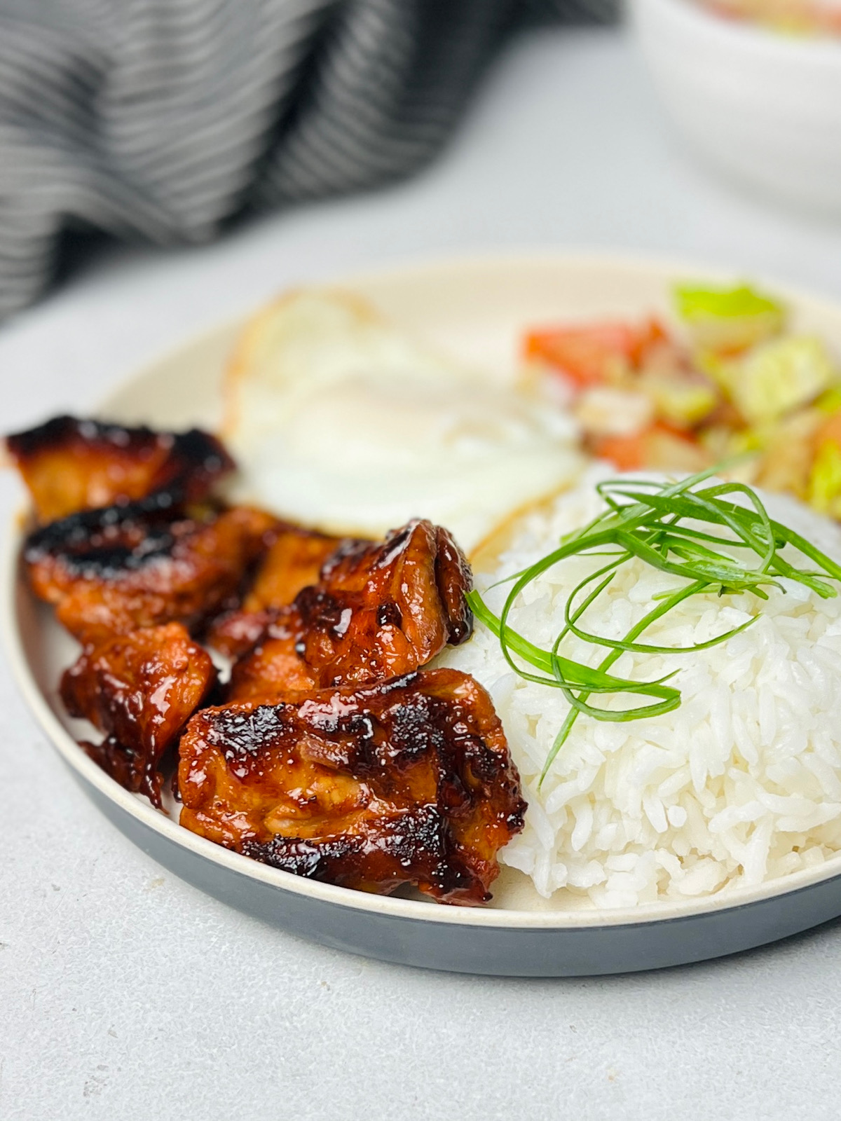 Chicken Tocino in the plate with rice and egg