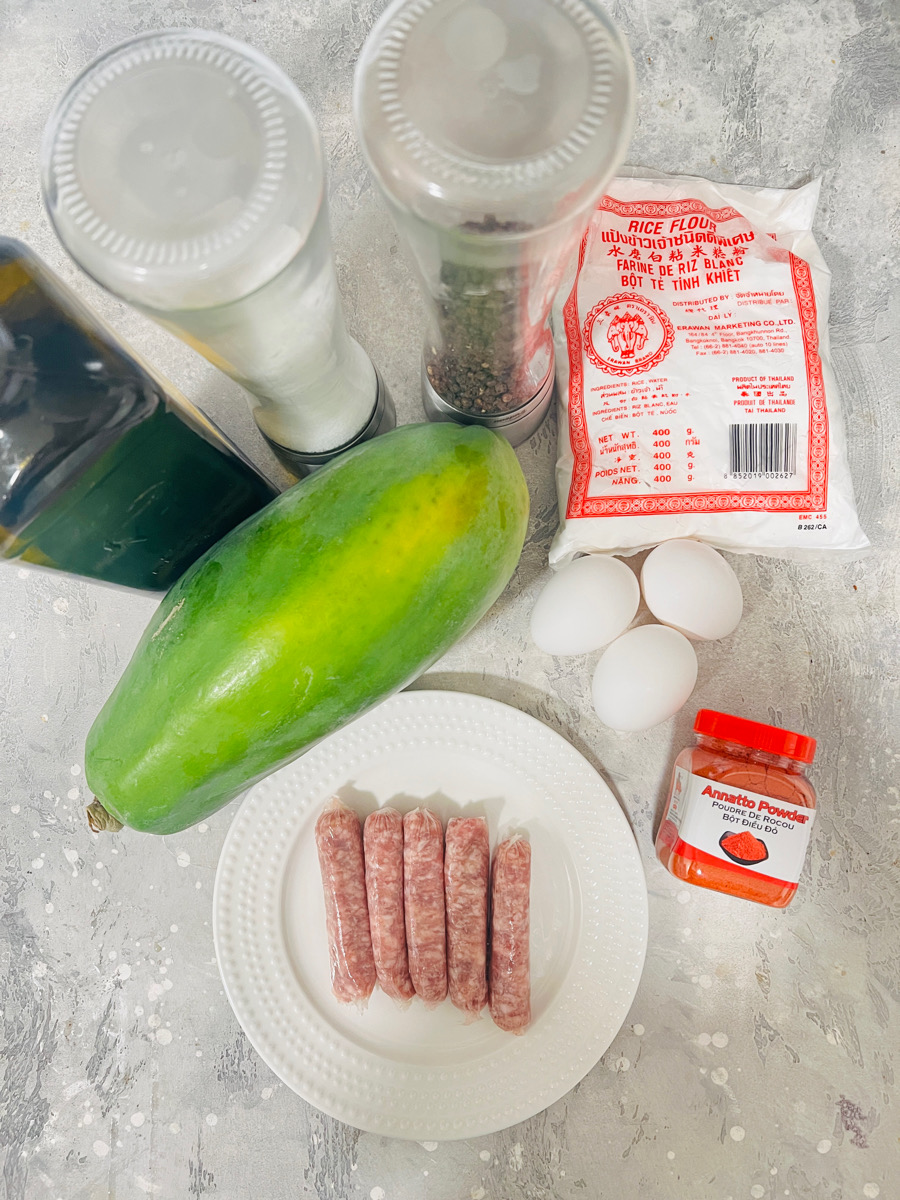 ingredients, papaya, eggs, longiganisa,rice flour to make ilocos empanada recipe